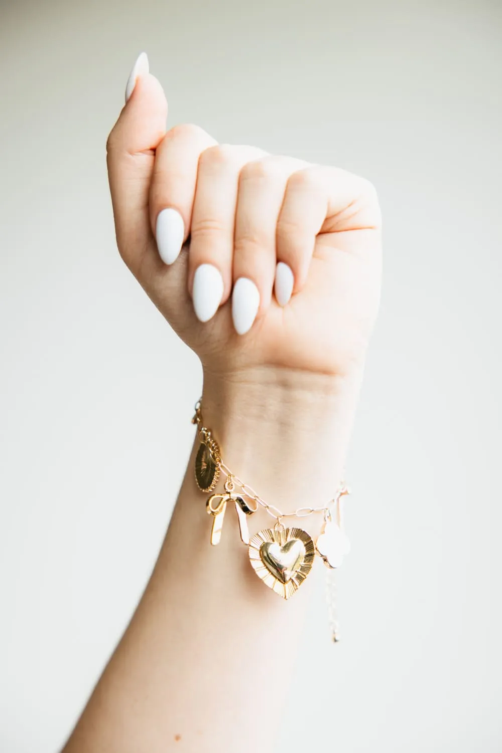7 Charm Bracelet in Gold | NBA112GDWHT